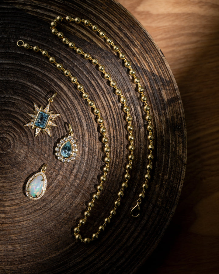 Pear shaped Opal Charm