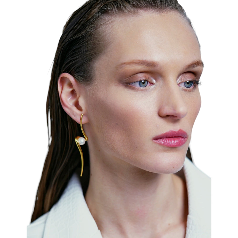 Crafted Perfection: The Dyname Pearl Earrings_Haniotis Hellas_Eternal Waves_pearl earrings, Aegean-inspired jewelry, Greek mythology, timeless elegance, heirloom jewelry, versatile accessories, ethically sourced materials, 14K gold, Nereid-inspired design, elegant minimalism, breathtaking craftsmanship