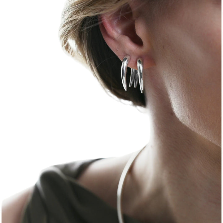 "Immerse yourself in the mystique of Greek legends with Rhene Earrings from Haniotis Hellas. Crafted with sterling silver, these statement pieces encapsulate timeless elegance, versatile for day or night. Experience Greek mythology-inspired jewelry at its finest