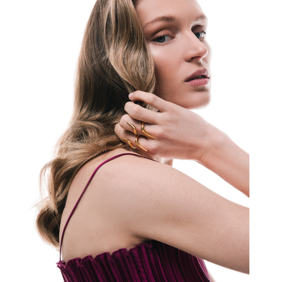 Discover the allure of the everlasting Harmony Ring from Haniotis Hellas. Crafted from 14K gold, this bold statement piece offers a touch of elegance whether worn day or night. Explore the timeless beauty inspired by Greek mythology and the Aegean Sea. Guaranteed authentic and ethically sourced, you can enjoy the Harmony Ring's luxurious allure with a lifetime guarantee. Elevate your style with a symbol of harmony and concord.