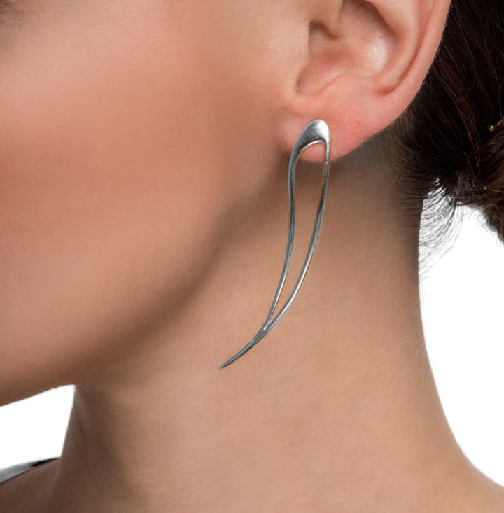 - Aegean earrings - Eternal Waves collection - Greek-inspired jewelry - Sterling silver earrings - Dynamic and edgy earrings - Daily accessory - Ethically sourced materials - Greek Summer symbolism - Heirloom jewelry - Certificate of Authenticity