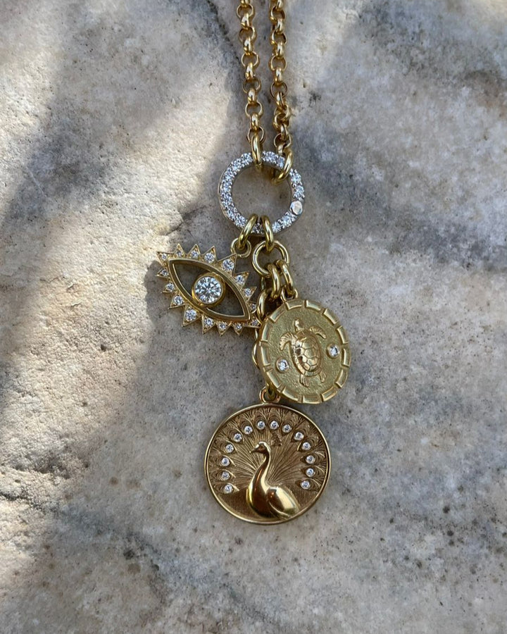 Gold necklace with charms