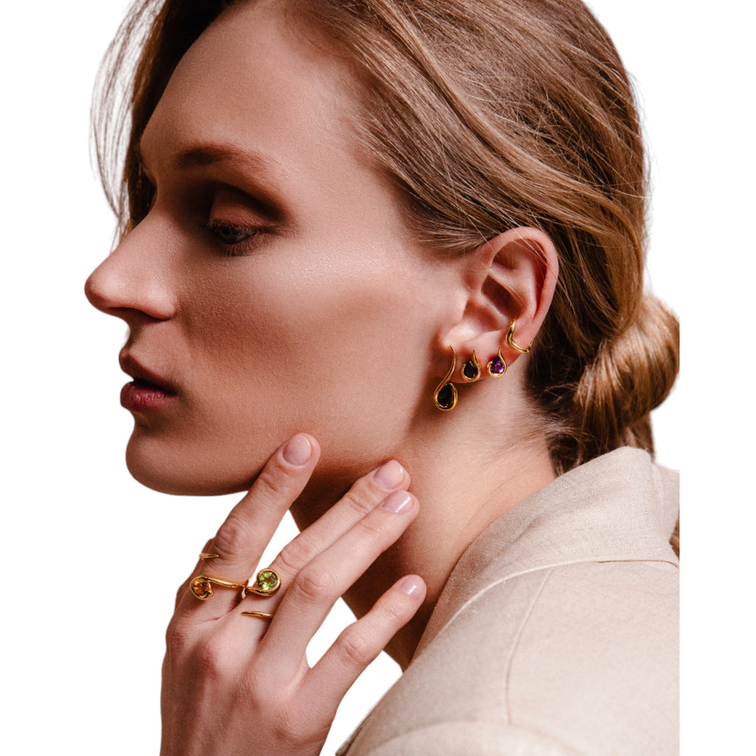 - Lara Earrings - Eternal Waves collection - Greek-inspired jewelry - 14K gold earrings - Sky Blue Topaz earrings - Smoky Quartz jewelry - Amethyst jewels - Peridot earrings - Citrine accessories - Timeless design - Curated ear look - Ethically sourced materials - Lifetime guarantee - Haniotis Hellas jewelry