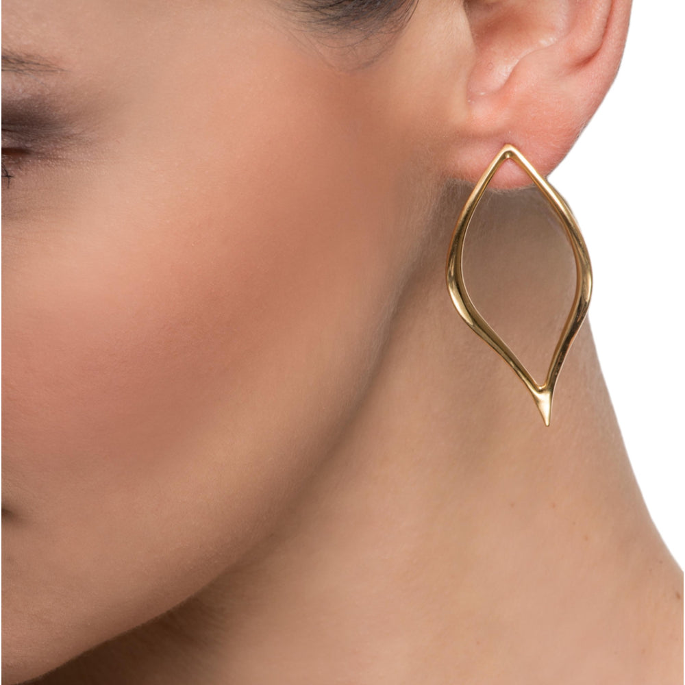Timeless Elegance: The Ascra Earrings from our Eternal Waves CollectionDiscover the captivating Ascra Earrings from our Eternal Waves collection. Crafted from exquisite 14K gold, these minimalist earrings follow the contours of your face, adding elegance to any look. Combine them with our Dione Necklace and Bracelet for a harmonious ensemble. Handcrafted in Greece by Haniotis Hellas, each pair comes with a certificate of authenticity.
