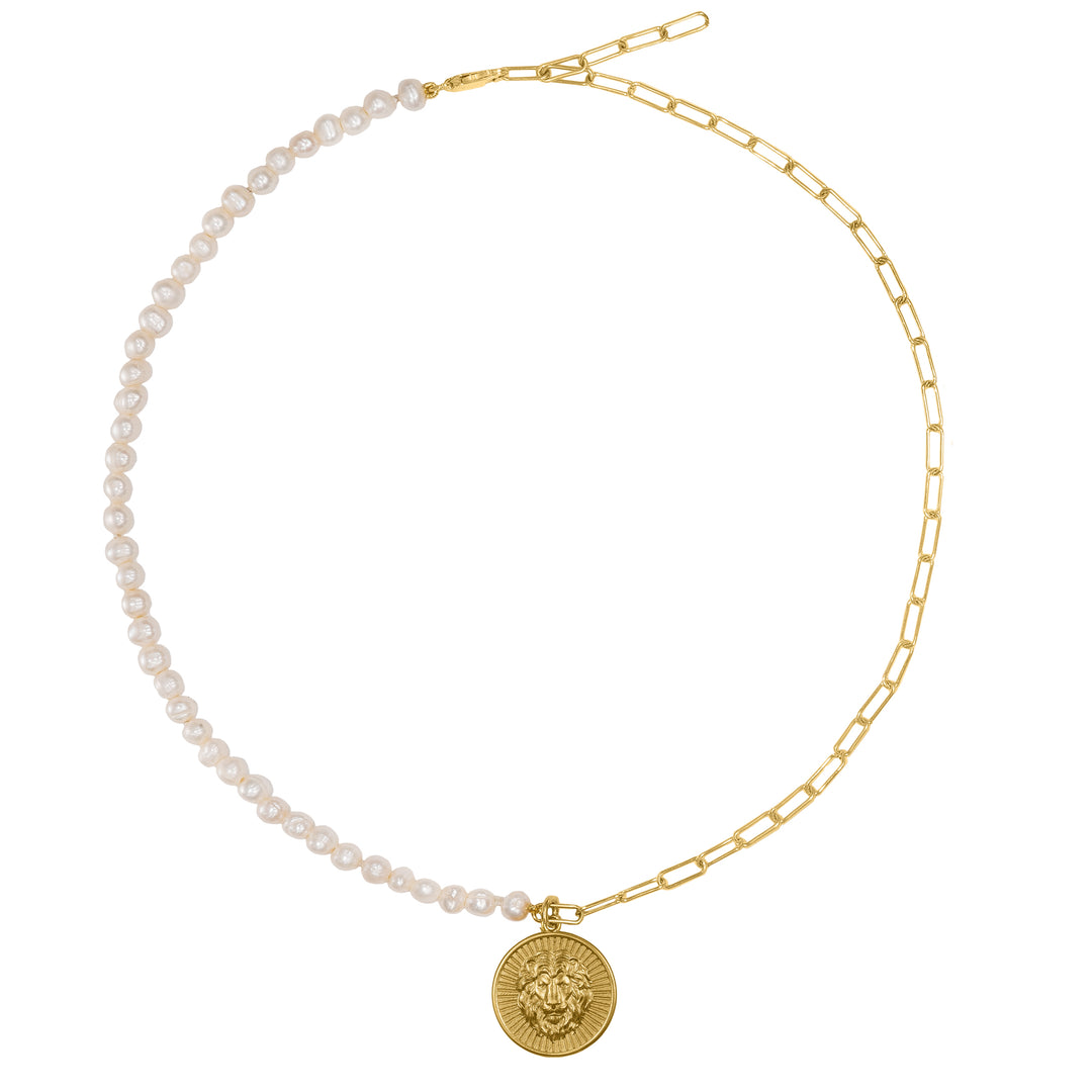 Lion charm in Gold 14K  with Freeshwater pearls. Experience the symbolic power of the Lion Symbol Charm from Haniotis Hellas' Mythic Treasures collection. Crafted in 14K gold in Athens, Greece, this captivating charm embodies the strength and symbolism of lions. Discover its design details and versatile styling options. Combine it with other collection charms for a unique and empowering adornment."