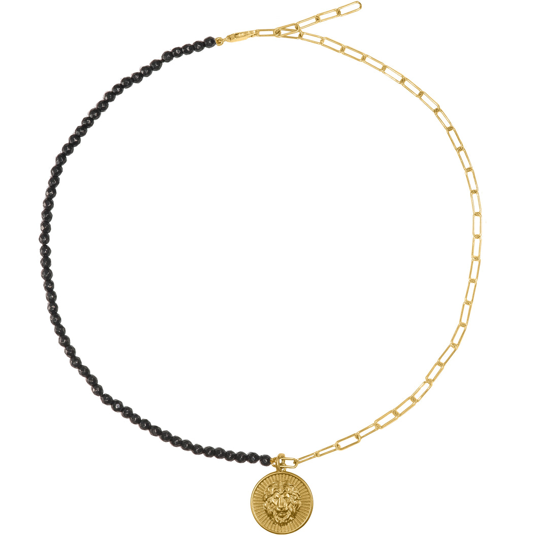 Lion charm in Gold 14k with Onyx chain.Crafted from 14K gold, the Lion Symbol Charm is produced in Athens, Greece, ensuring top-notch quality. It comes with a clasp, allowing it to be effortlessly hung on any chain from the Mythic Treasures collection. Combine it with other charms like the bee and ouroboros to create a truly exceptional and personalized look.